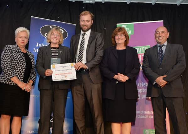 Jane Hayward of Textbook Creative presents Manor School Sports College with their Secondary School of the Year award.
PICTURE: ANDREW CARPENTER