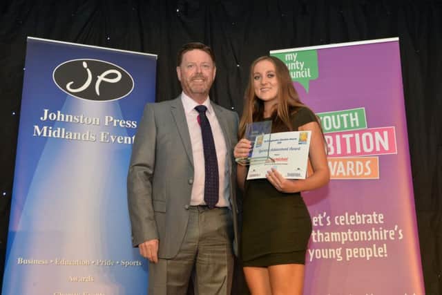 Mick Spittle of Qube Modular Buildings presents the Sporting Achievement award to Lily Carmichael.
PICTURE: ANDREW CARPENTER