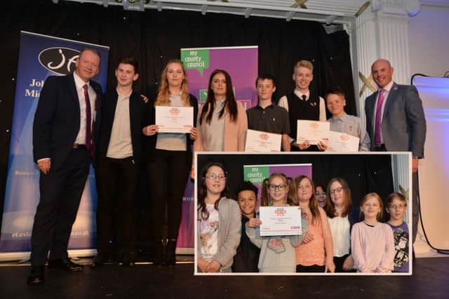Dave Crichton of Canon presents the finalists with their Project or Campaign of the Year certificates with Councillor Matthew Golby and insert is A Pack of Seniors.
PICTURE: ANDREW CARPENTER