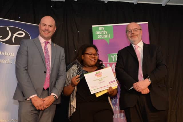 Nick Bell of Prospects presents The Taking Charge of your Life Award to Pascale Cordell with Councillor Matthew Golby.PICTURE: ANDREW CARPENTER