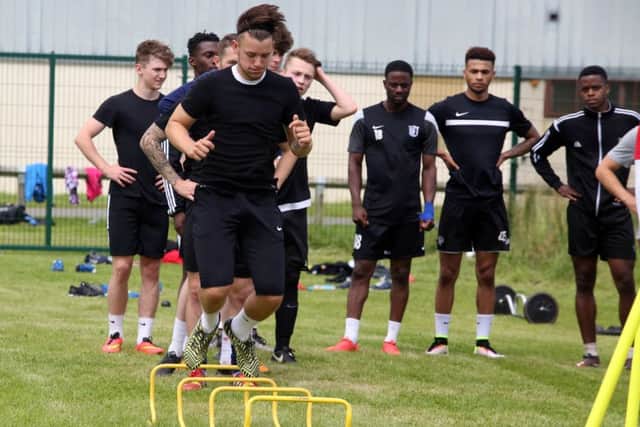 The Corby players were put through a tough two-hour session at Steel Park