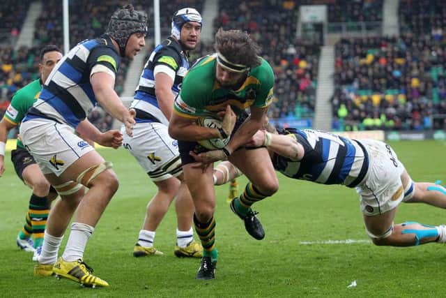 Saints skipper Tom Wood will lead his team out against Bath at Franklin's Gardens on the first day of the new season on Saturda, September 3