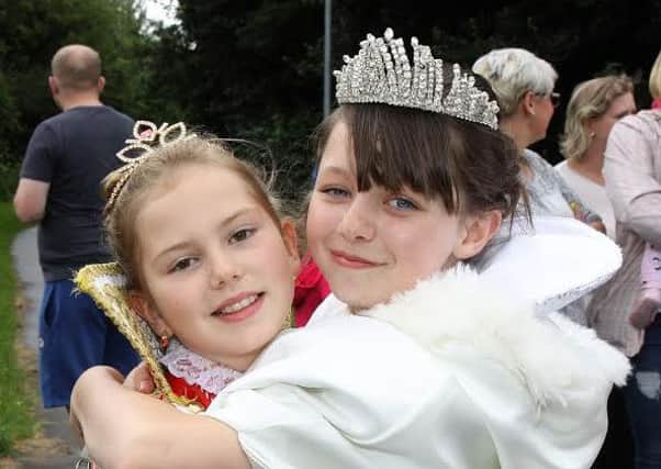 Corby carnival 2016. Velvert princess Lia Zander greets Corby princess Aimee Ballantyne