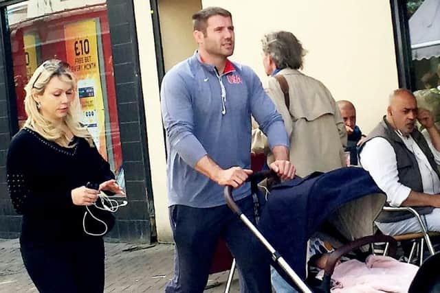 England world cup winning rugby star Ben Cohen and his Strictly Come Dancing girlfriend Kristina Rihanoff with their new baby in Fish Street, Northampton. Picture via SWNS. NNL-160714-105354001