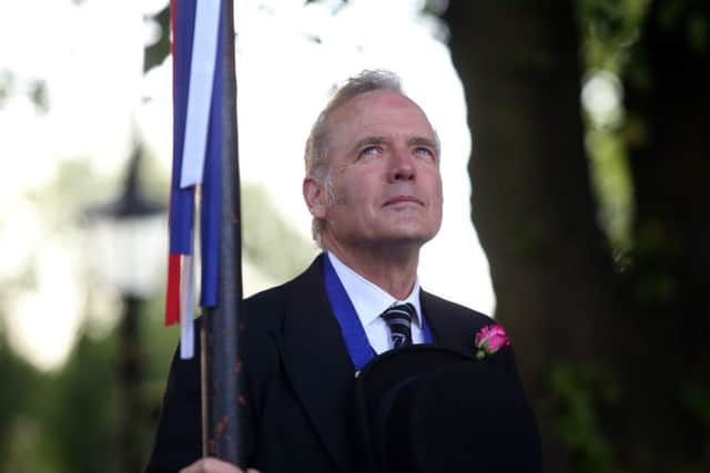 Alan Mills in charge for the first year reading the charter at Rowell Charter Fair in 2015