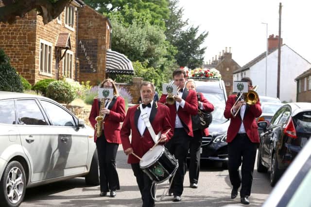 The band playing ahead of Cllr Bailey's funeral