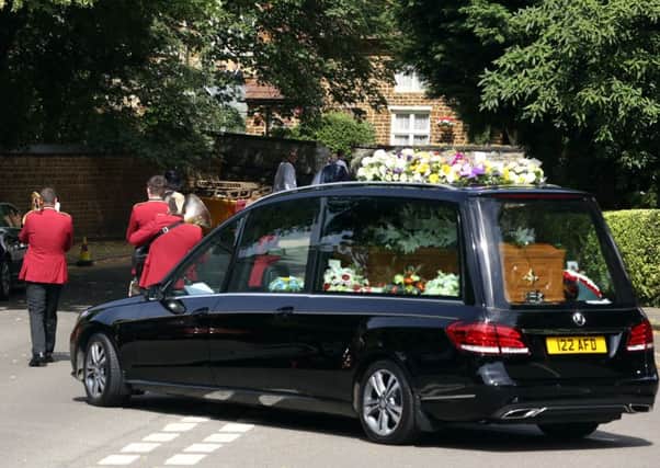 The funeral cortege for Cllr John Bailey