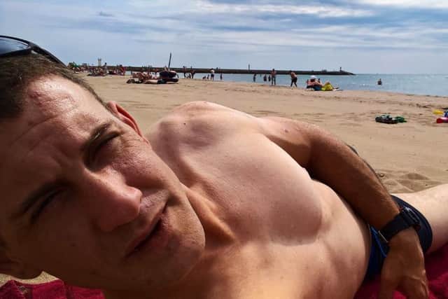 James Watson on the beach