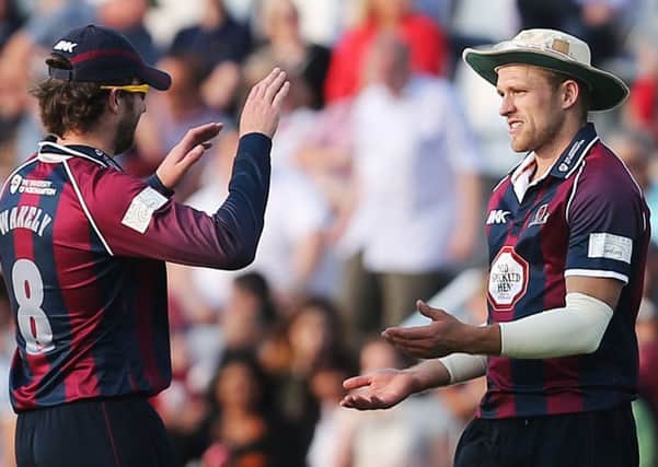 BEST OF ENEMIES - pals Alex Wakely (left) and David Willey will be on opposite teams at the County Ground on Friday night