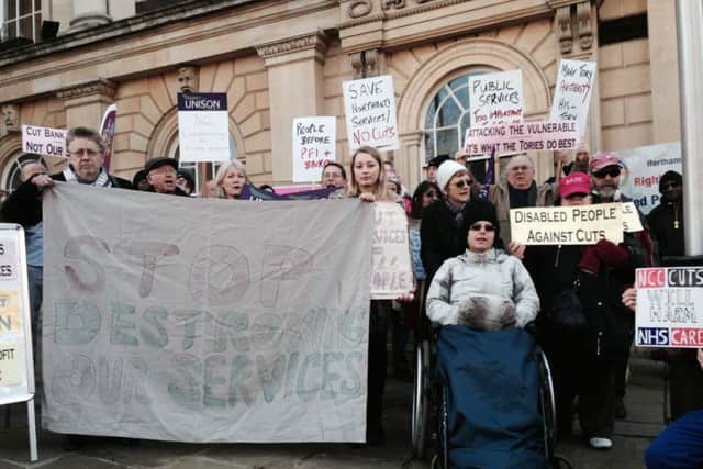 Members of the public, union members and service users protested against the planned £65m worth of cuts to the county council outside County Hall in February. Now more cuts are on the horizon.