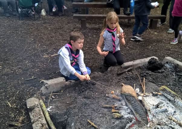A new scout group established in Kettering less than a year ago has attracted 60 members