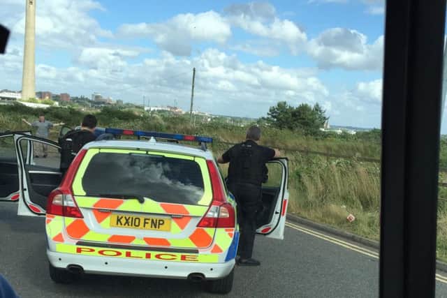 Armed officers take part in a training exercise by Sixfields tip...though passers by thought they were witnessing a stand off yesterday.