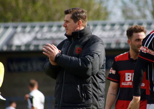 The pressure is on Kettering Town manager Marcus Law and his players to deliver promotion this season