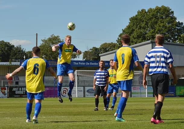 Action from Wellingborough Town's 3-1 home defeat to Stotfold in the extra preliminary round of the FA Cup. Picture by Jim McAlwane