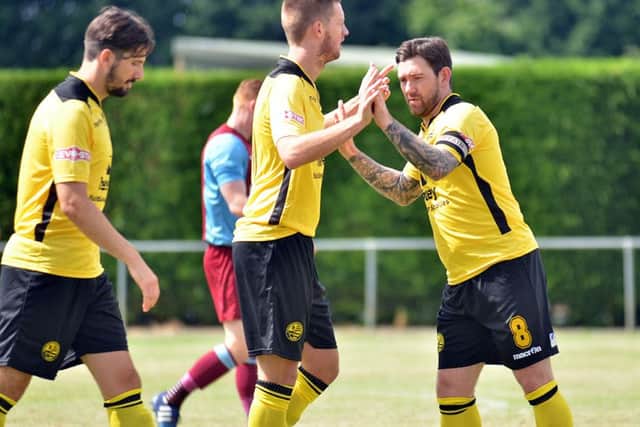 Summer signing Jake Newman celebrates his goal during AFC Rushden & Diamonds' pre-season win at Deeping Rangers. Andy Peaks' team start the new season this weekend