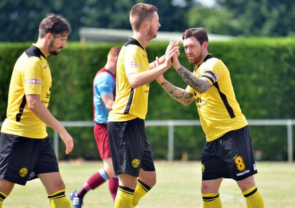 Summer signing Jake Newman celebrates his goal during AFC Rushden & Diamonds' pre-season win at Deeping Rangers. Andy Peaks' team start the new season this weekend