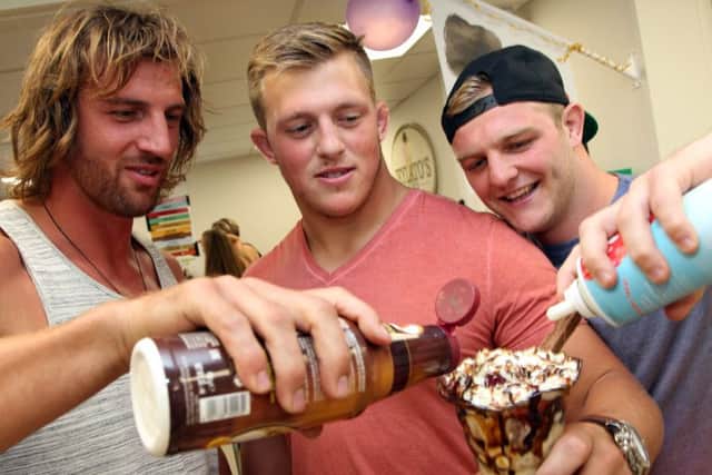 Saints rugby stars Tom Wood, Alex Waller and Mike Haywood at the opening of Jeylato's in Earls Barton