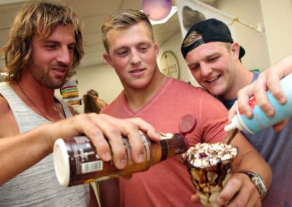 Saints rugby stars Tom Wood, Alex Waller and Mike Haywood at the opening of Jeylato's in Earls Barton