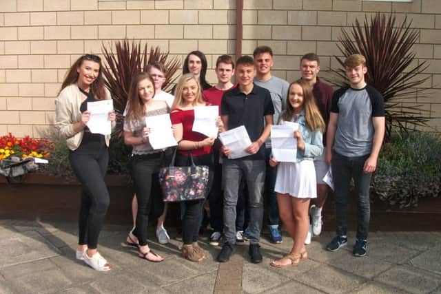 Students at Brooke Weston with their A-level results