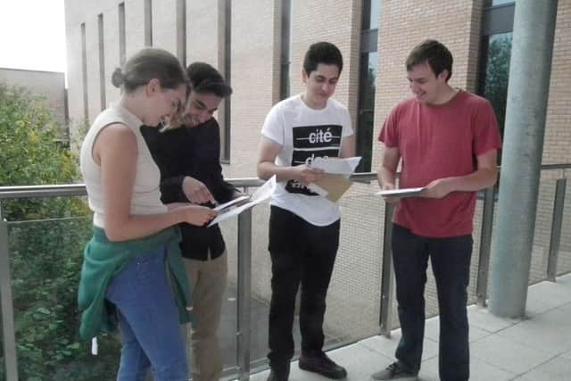 Students open their results.