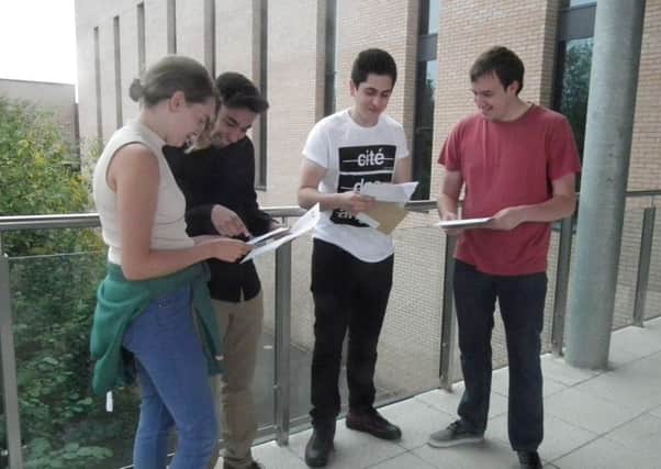 Students open their results.