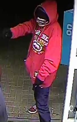 Another view of the man who police want to speak to