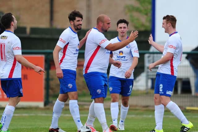Liam Dolman takes the congratulations after he scored Diamonds' fourth goal