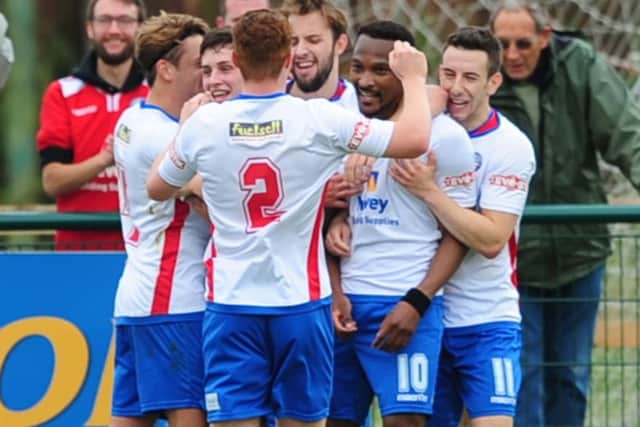 Nabil Shariff takes the congratulations after completing his hat-trick in AFC Rushden & Diamonds' FA Cup win over Sileby Rangers. Picture by Mike Capps/www.kappasport.co.uk