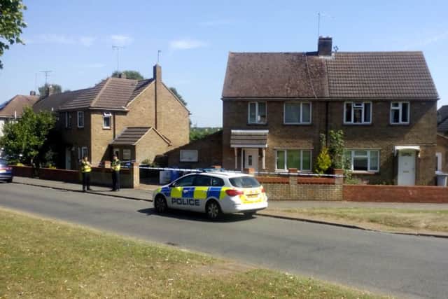 The house in Stamford Road, where a cordon remains.