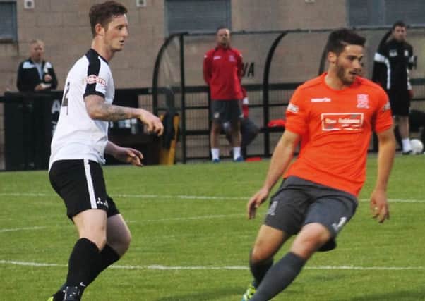 Brad-Lee Gascoigne in action for Corby Town during last night's 0-0 draw with Stafford Rangers. Picture by David Tilley