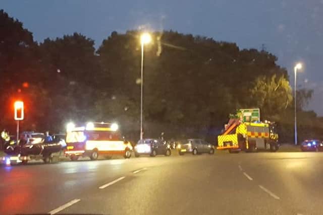 Police and fire crews attending an incident at the Bedford Road roundabout last night. To the left of the image a boat crew is visible. Submitted picture.