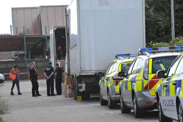 Police searching a lorry for illegal immigrants
