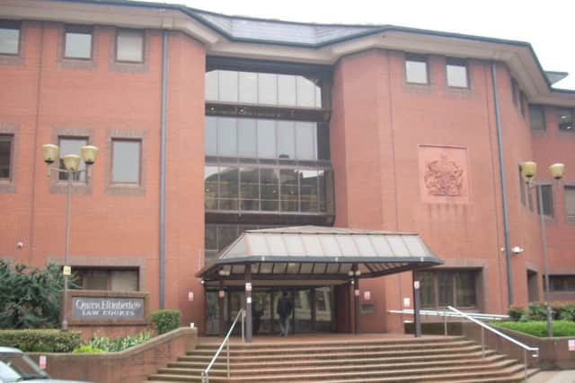 Two men have gone on trial accused of blasting a man in the back with a shotgun on a Rushden street