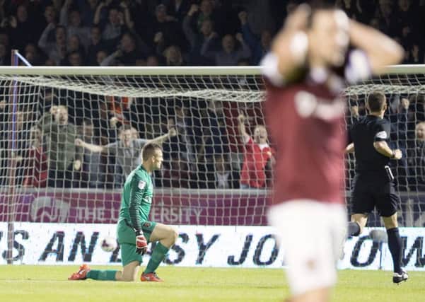 Cobblers keeper Adam Smith was beaten three times (picture: Kirsty Edmonds)