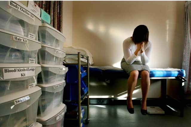 PICTURE POSED BY MODEL
File photo dated 31/01/07 of a woman waiting to be seen by a doctor in the medical room at a specialist rape clinic in Kent. Every victim of rape should be offered the support of a specialist adviser to help them keep faith in the criminal justice system, a landmark review recommended today. PRESS ASSOCIATION Photo. Issue date: Monday March 15, 2010. Hundreds of independent workers would help those whose lives were torn apart by sexual violence make sense of the police inquiry and the prosecution of those responsible. Baroness Stern said independent sexual violence advisers, a post being piloted in some areas, provide a key link between the victim and police, prosecutors and charity groups. See PA story POLITICS Stern. Photo credit should read: Gareth Fuller/PA Wire ENGNNL00120110714151009