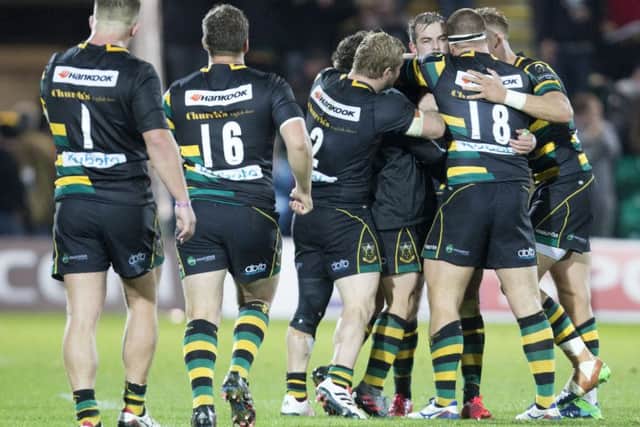 Stephen Myler was mobbed by his team-mates after landing the match-winning kick (pictures: Kirsty Edmonds)