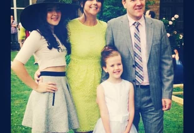 Eve with her mum and dad, Suzanne and Tommy Lyons