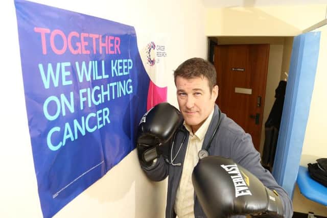 Dr Adrian Perkins will fight against an as-yet-unknown competitor on his 51st birthday on November 12 to raise funds for Cancer Research