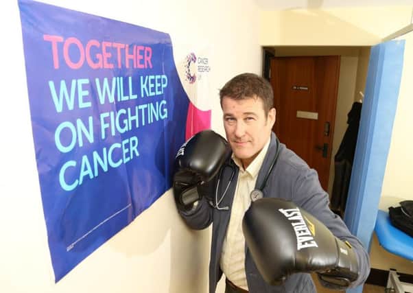 Dr Adrian Perkins will fight against an as-yet-unknown competitor on his 51st birthday on November 12 to raise funds for Cancer Research