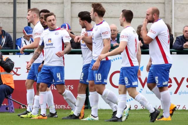 AFC Rushden & Diamonds' players celebrate Jask Ashton's goal against Coalville Town on Saturday. Picture by Alison Bagley