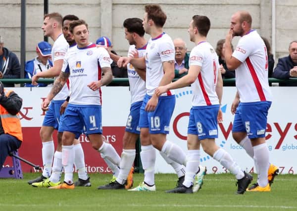 AFC Rushden & Diamonds' players celebrate Jask Ashton's goal against Coalville Town on Saturday. Picture by Alison Bagley