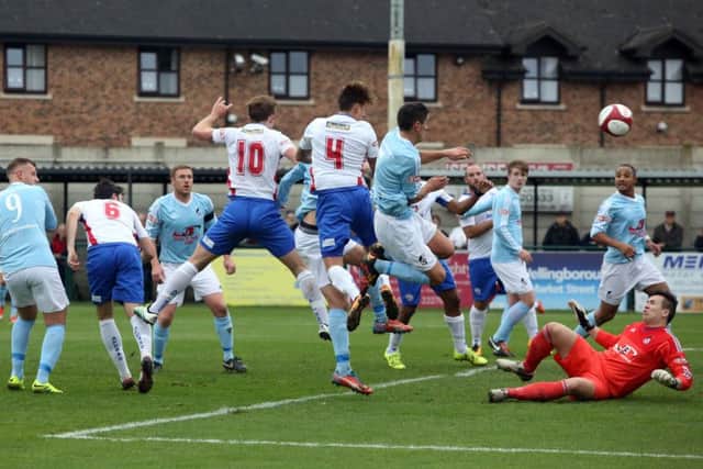 Jack Ashton heads home the winning goal as AFC Rushden & Diamonds beat Coalville Town in the FA Trophy. Pictures by Alison Bagley