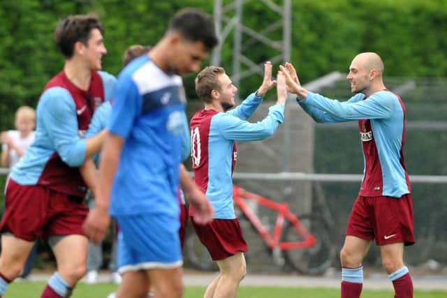 Deeping celebrate their goal during the 1-0 win, which ended Desborough Town's 13-match unbeaten run in the UCL Premier Division. Picture by Tim Wilson