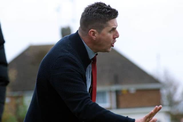 Poppies boss Marcus Law gives out instructions during the 5-1 victory over Market Drayton Town. Picture by Peter Short