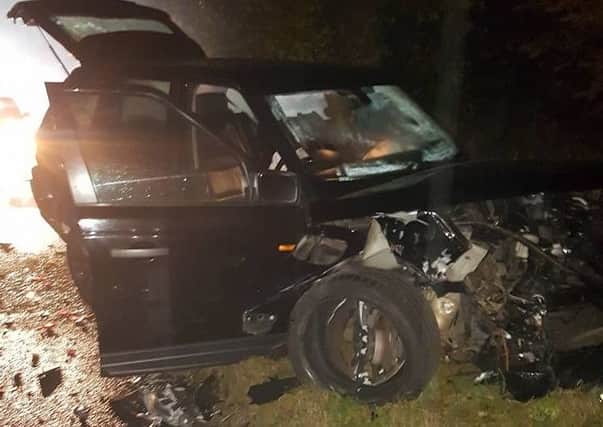 The black Range Rover involved in the crash. The driver of this car sustained minor injuries.