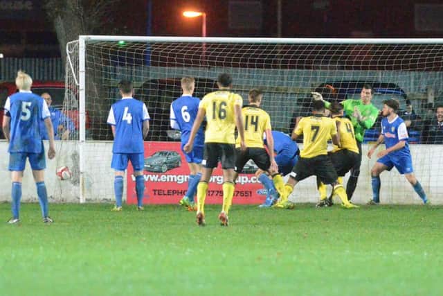 Jack Ashton heads home the winner for 10-man Diamonds