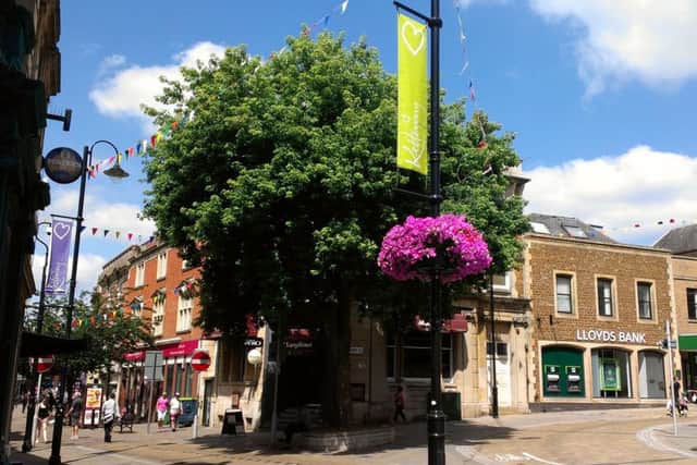 Kettering town centre, corner of Market Street and High Street (just off the Market Place) NNL-140722-144018001