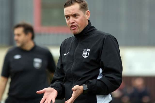 Gary Mills takes his Corby Town team to Cogenhoe United in the last eight of the NFA Hillier Senior Cup this evening