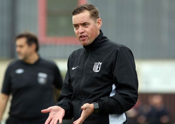 Gary Mills takes his Corby Town team to Cogenhoe United in the last eight of the NFA Hillier Senior Cup this evening