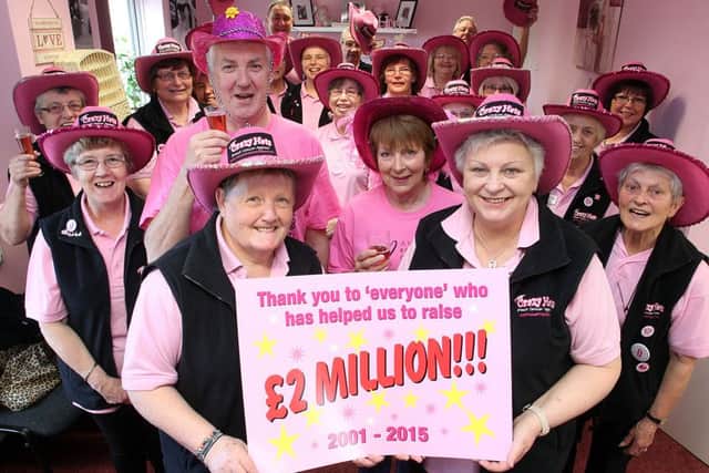 The Crazy Hats team celebrating reaching the Â£2 million mark